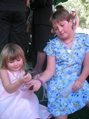 Children releasing butterflies at the funeral of their sister near West Palm Beach, FL