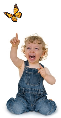 Young girl pointing out a Mississippi Monarch butterfly release.